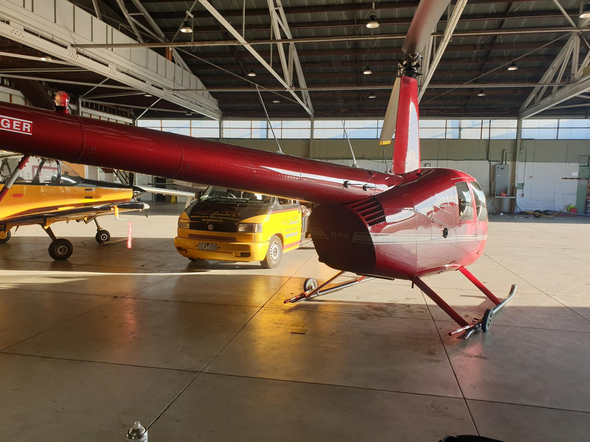 Helicopter spray painted by Lucio in a hangar